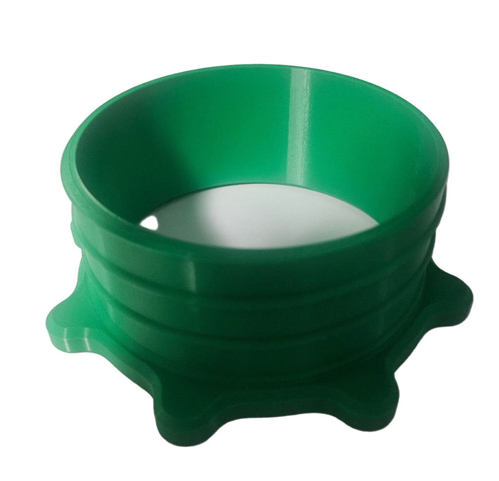 Green, plastic manufactured part with radial flange rings.